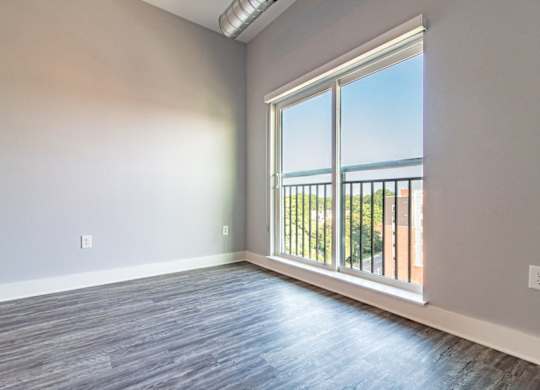 Large windows overlooking downtown Concord, NC at Novi Flats