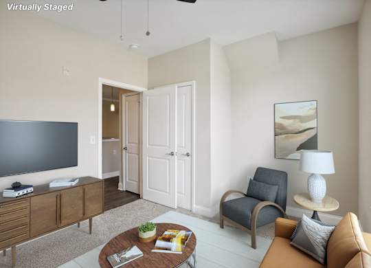 a living room with a couch and a tv