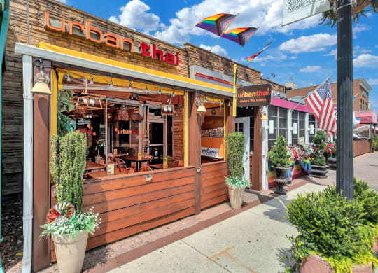 the front of a restaurant on a sidewalk