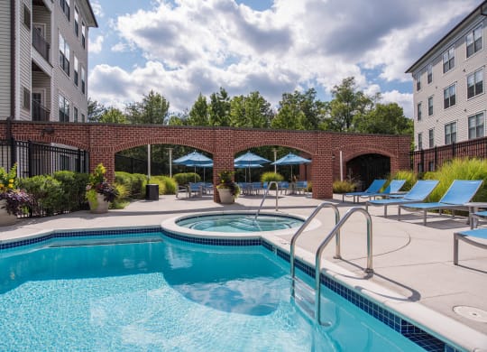 Swimming Pool With Relaxing Sundecks at The Cosmopolitan at Lorton Station, Virginia