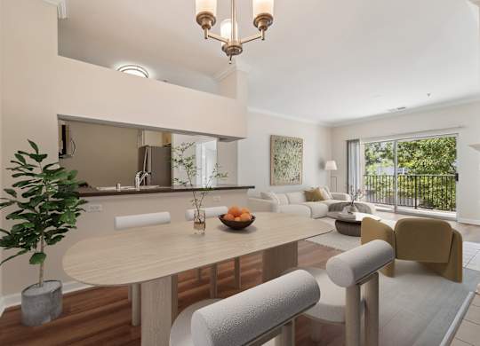 A modern dining room with a round table and chairs.