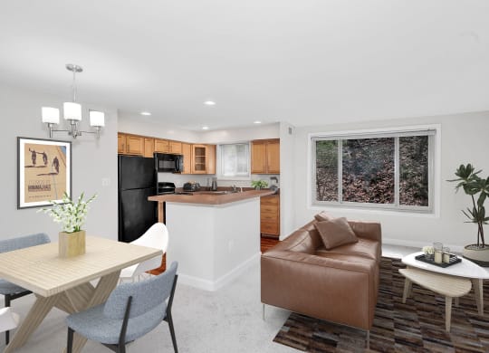 a living room and kitchen in a 555 waverly unit