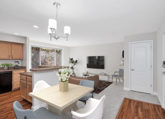 a living room with a table and chairs