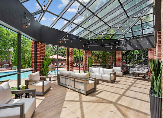 A sunny day at the outdoor patio with a pool.