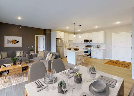 A modern dining room with a wooden table set for two.