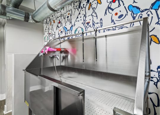 a kitchen with a stainless steel counter top and a sink