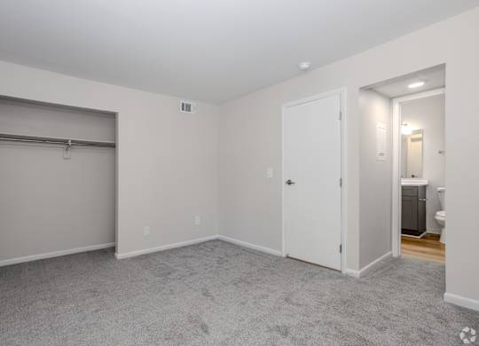A room with a grey carpet and white walls. at Commons At Waters Edge, Columbus Ohio