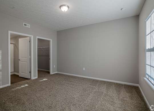 Carpeted Bedroom at The Residences at Akita Lane, Canal Winchester Ohio
