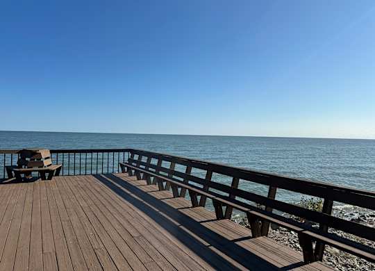 A wooden deck overlooks Lake Erie