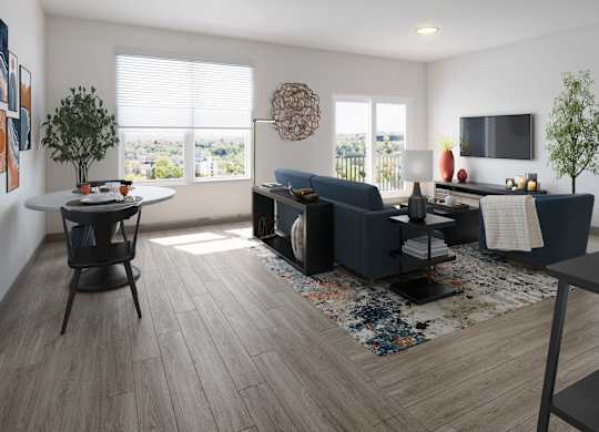 A modern living room with a large window with a view of the Cleveland