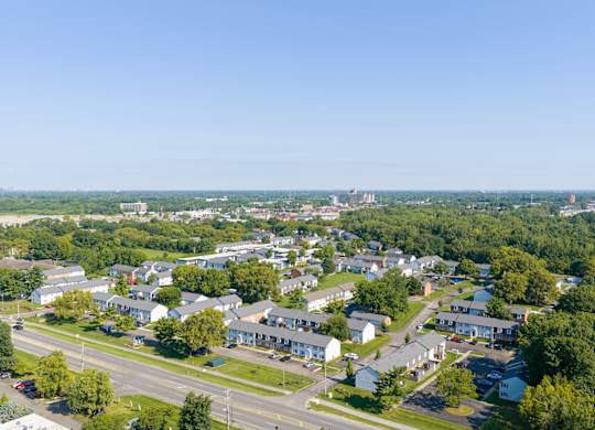 A small town with a mix of houses and buildings.