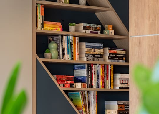 A bookshelf with various books at The Park Apartments, Cleveland , OH