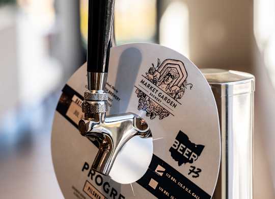 A beer tap with a label at The Park Apartments, Cleveland , Ohio