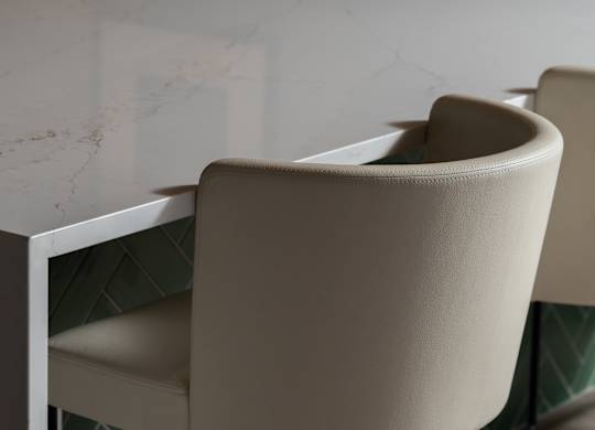 A white chair with a beige seat at The Park Apartments, Cleveland 44113