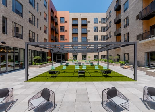 Courtyard with seating area at TREO Apartments, Cleveland, OH