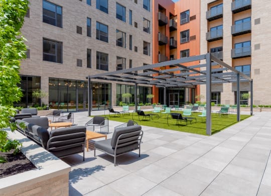an outdoor lounge area at TREO Apartments, Cleveland