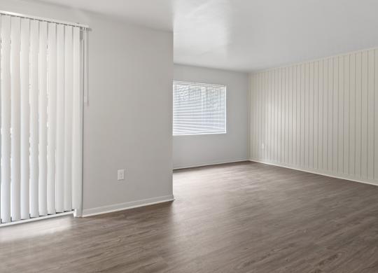A room with wooden floors and white walls.at Commons At Waters Edge, Columbus, 43232