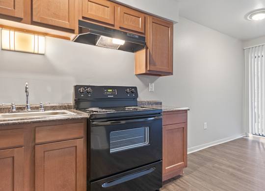 Kitchen with modern finishes at Commons At Waters Edge, Columbus
