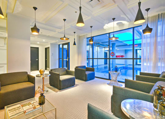 Relaxing area with chairs next to the indoor pool