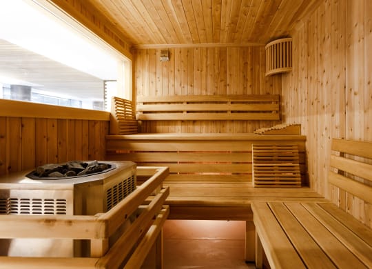 a sauna with wooden walls and a table