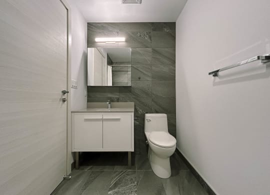 a small bathroom with a toilet and a sink
