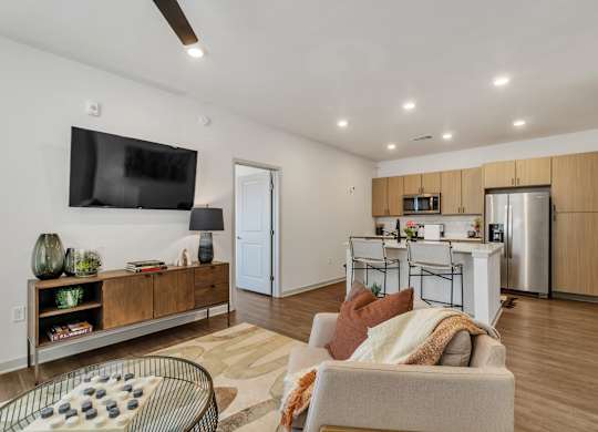 the living room and dining area at Apex apartments in Colorado Springs, CO