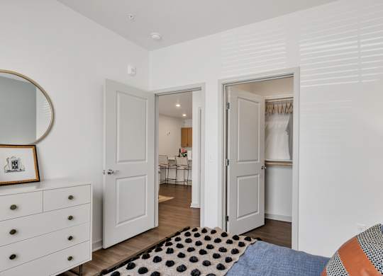 a bedroom and a closet at Apex apartments in Colorado Springs, CO