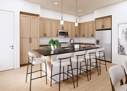 a kitchen with a large island with bar stools