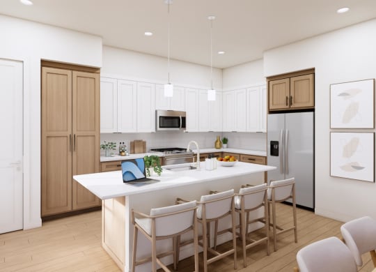 a white kitchen with a large island and white chairs