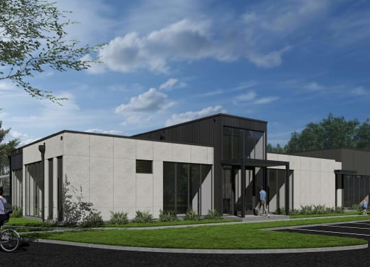 a rendering of a concrete building with a lawn and a sidewalk