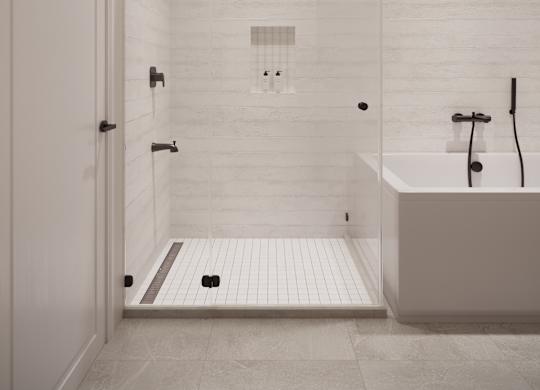 A white bathroom with a walk in shower and a bathtub.