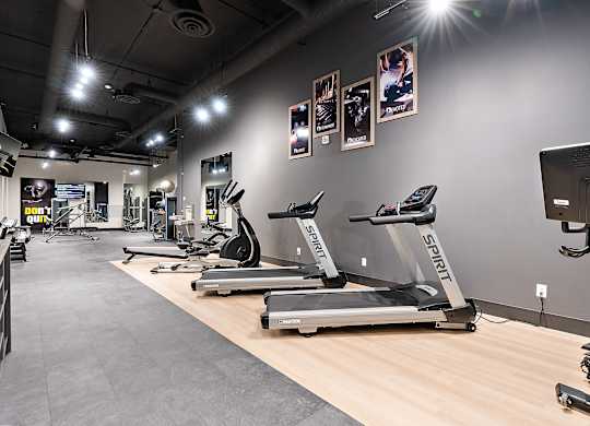 A gym with treadmills and exercise equipment.at Raymond Block, Edmonton