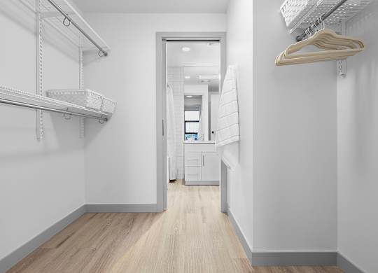 walk-in closet at Raymond Block, Edmonton Alberta T6E 3R7