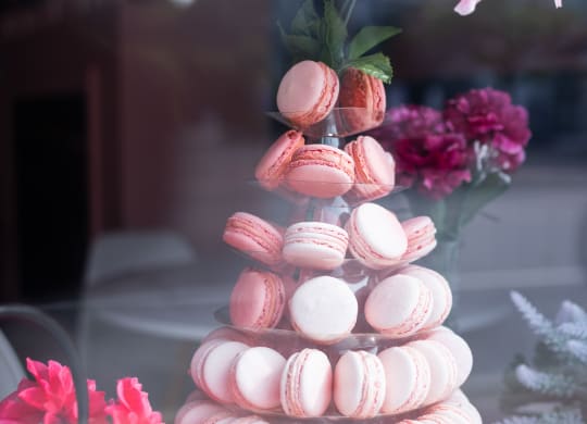a wedding cake made out of macaroons