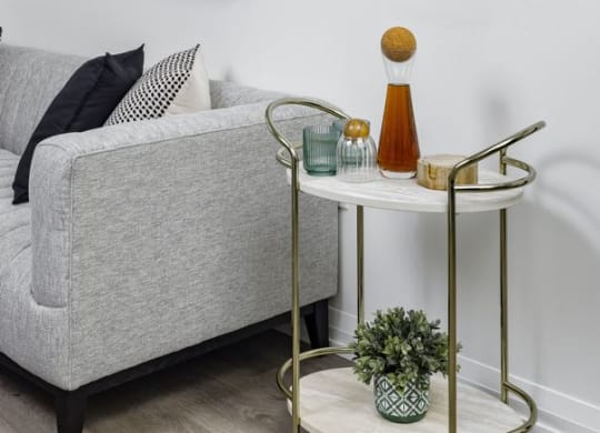 a living room with a couch and a table
