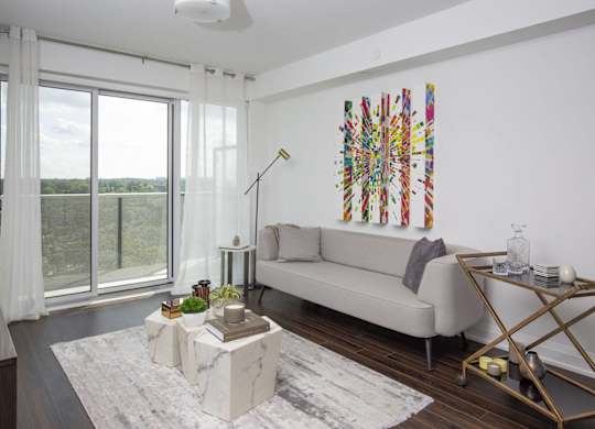 a living room with a couch and a table