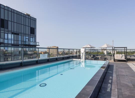 a view of the rooftop pool at the graduate madison hotel in madison, wi
