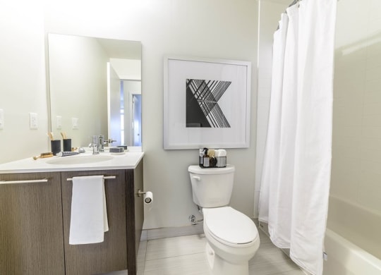 a bathroom with a toilet and a sink