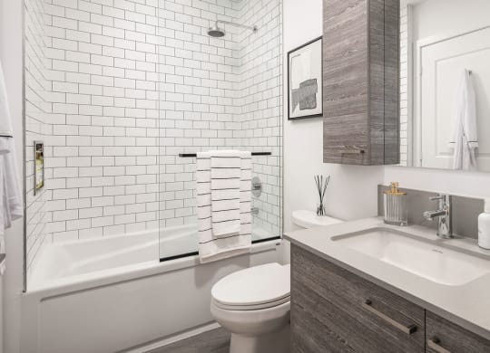 bathroom with full bath and shower