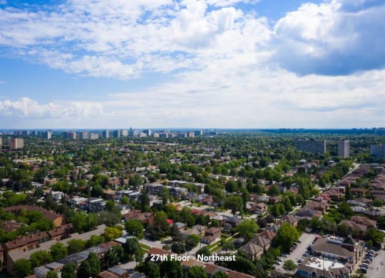 a view of the city from the top of a skyscraper
