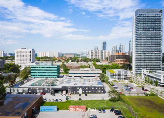 a view of the city from the roof of a building