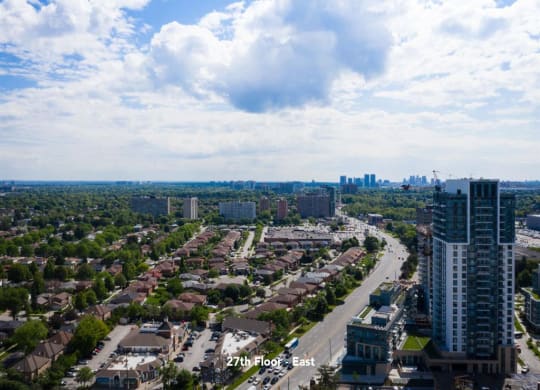 a view of the city from the top of a skyscraper