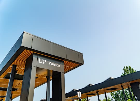 A modern building entrance with the sign