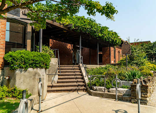 A building with a staircase leading to the entrance.