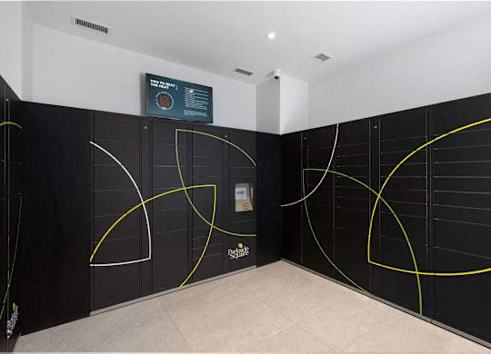 A black and yellow room with a sign on the wall.