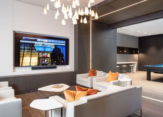 a living room with couches and a television