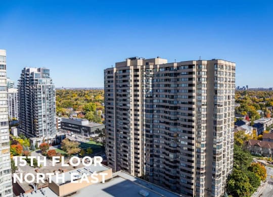 an aerial view of two highrise condos in the city of north east toronto