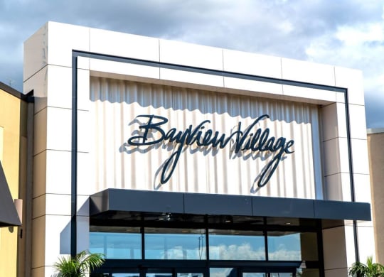 the front of a building with a barbour logo on it