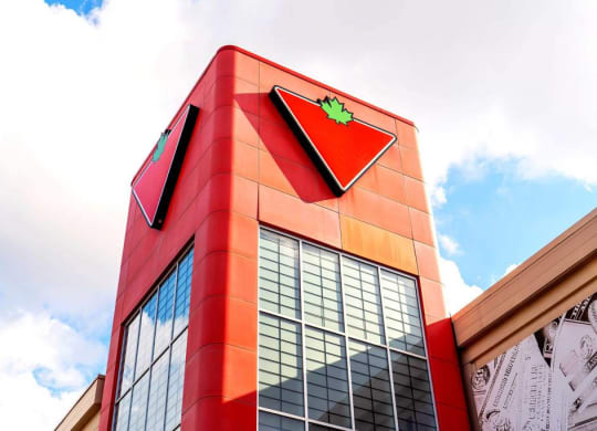 the facade of a building with a sign on top of it