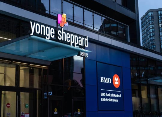 a yonge street sign on the side of a building